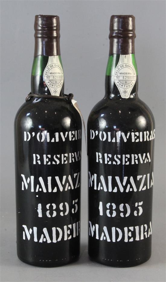 Two bottles of DOliveiras Reserva Malvazia Madeira, 1895.